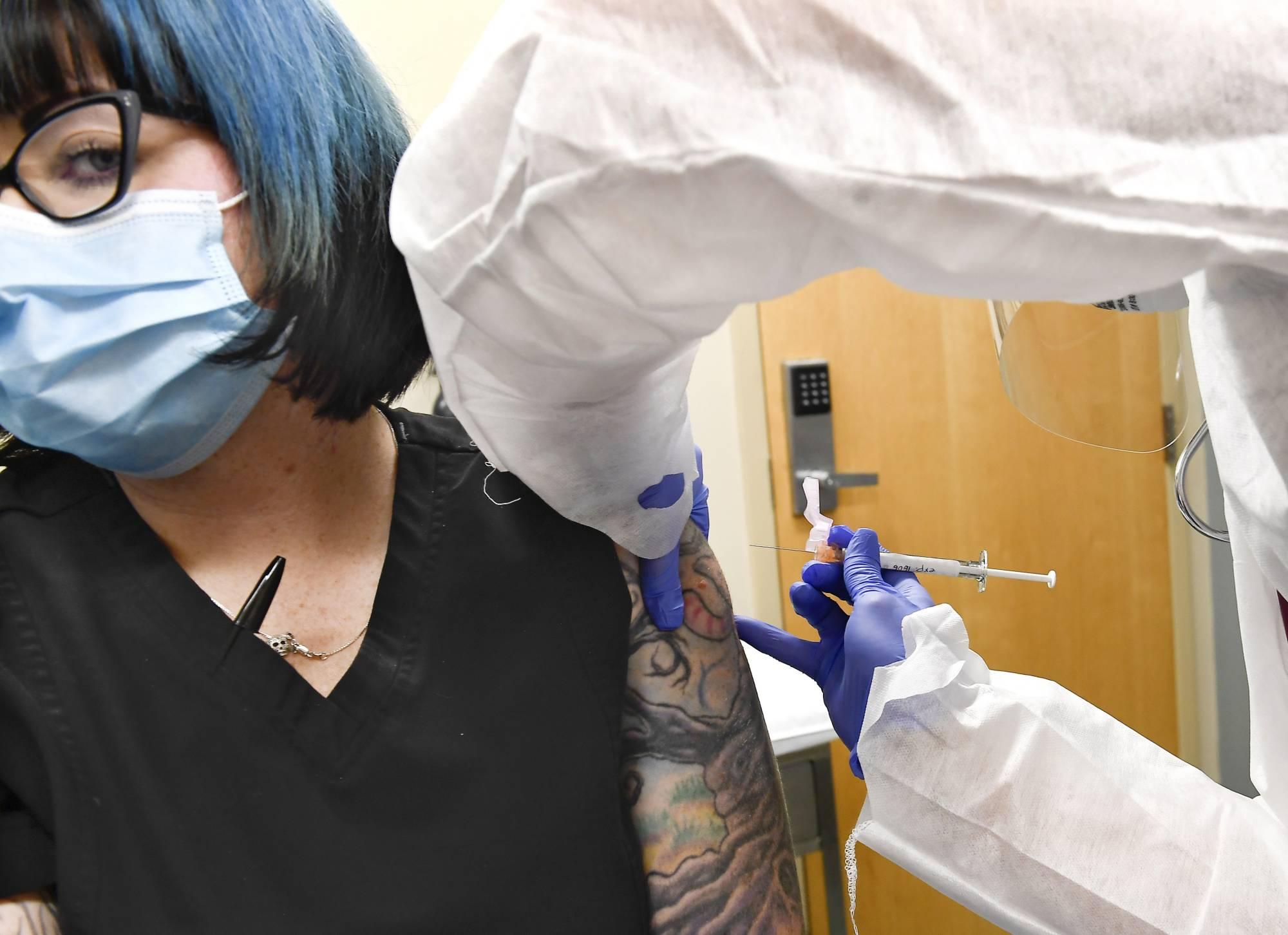 Vaccine confronts humanity with next moral test - The Japan Times