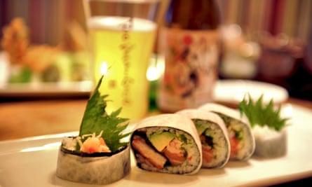 Plate of hand rolls and a beer at Tomo Sushi, Amsterdam, the Netherlands.